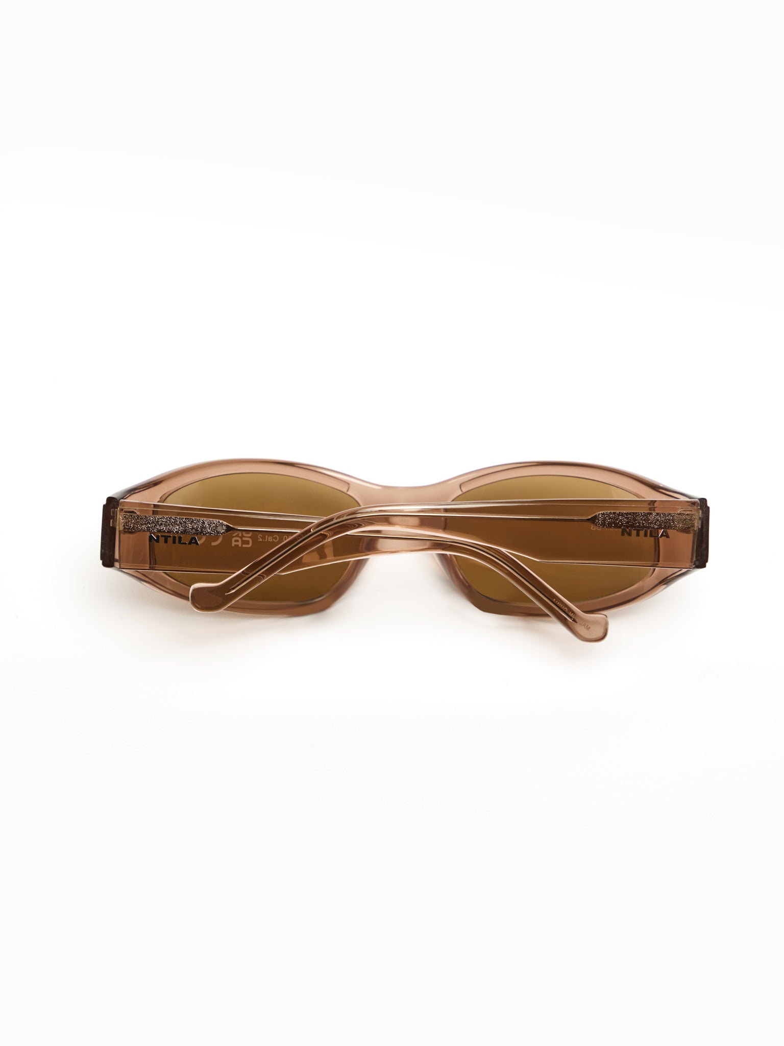 NTILA Ace brown toffee rose gold oval sunglasses on a white background