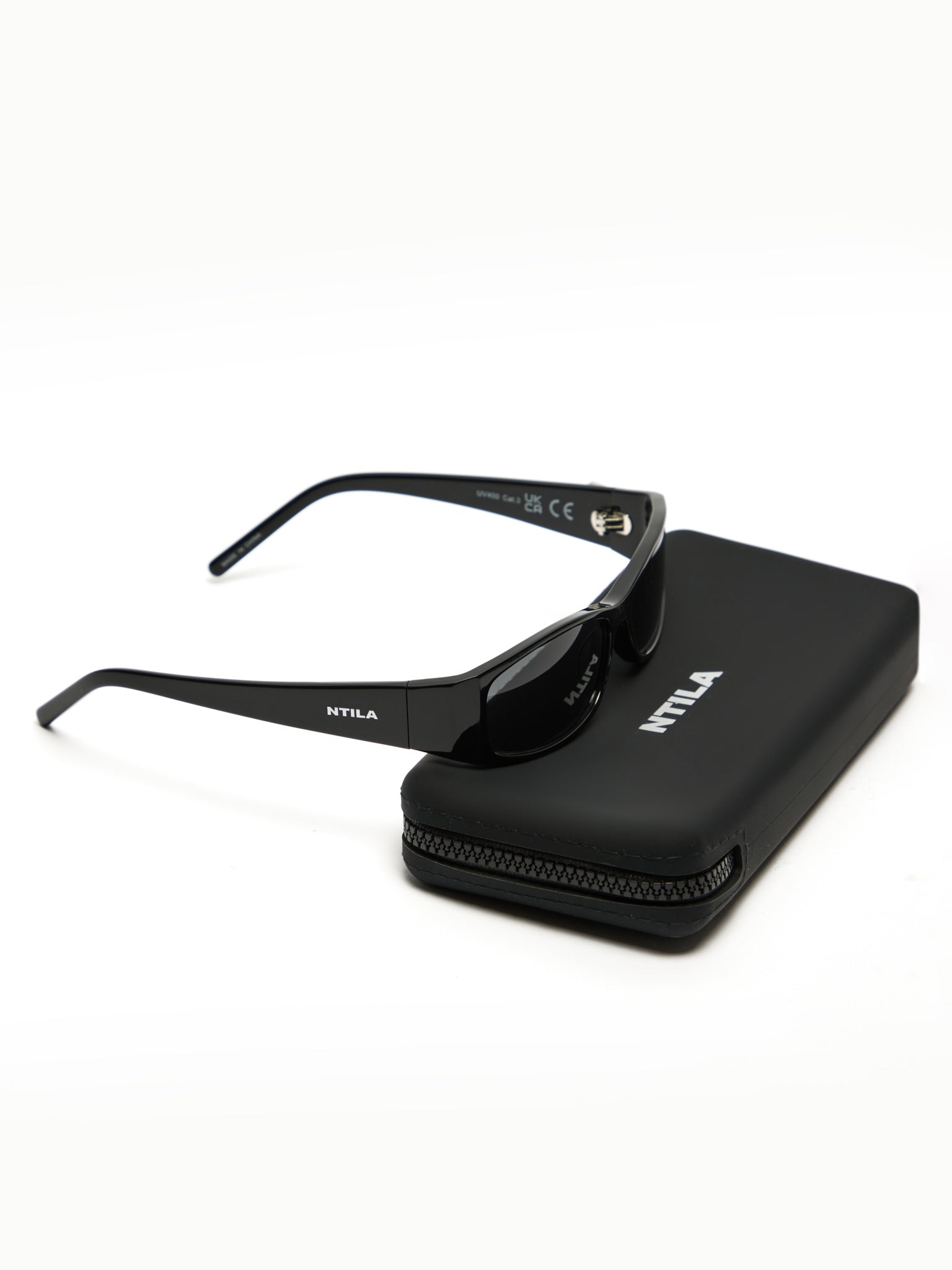 Roko black sunglasses with 'NTILA' branding on a white background